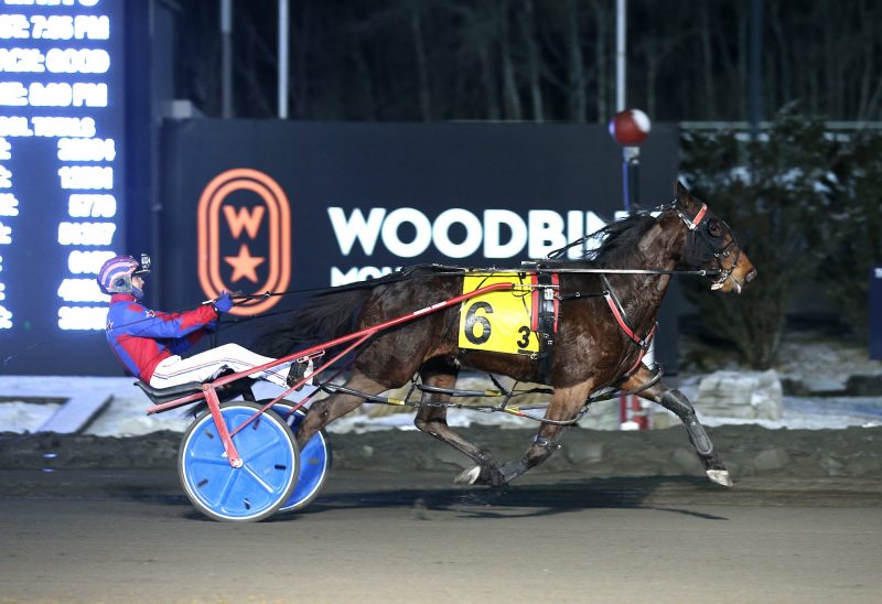 Natasha Day and Mach My Kiss winning Woodbine's International Women's Day race on March 7. (New Image Media)