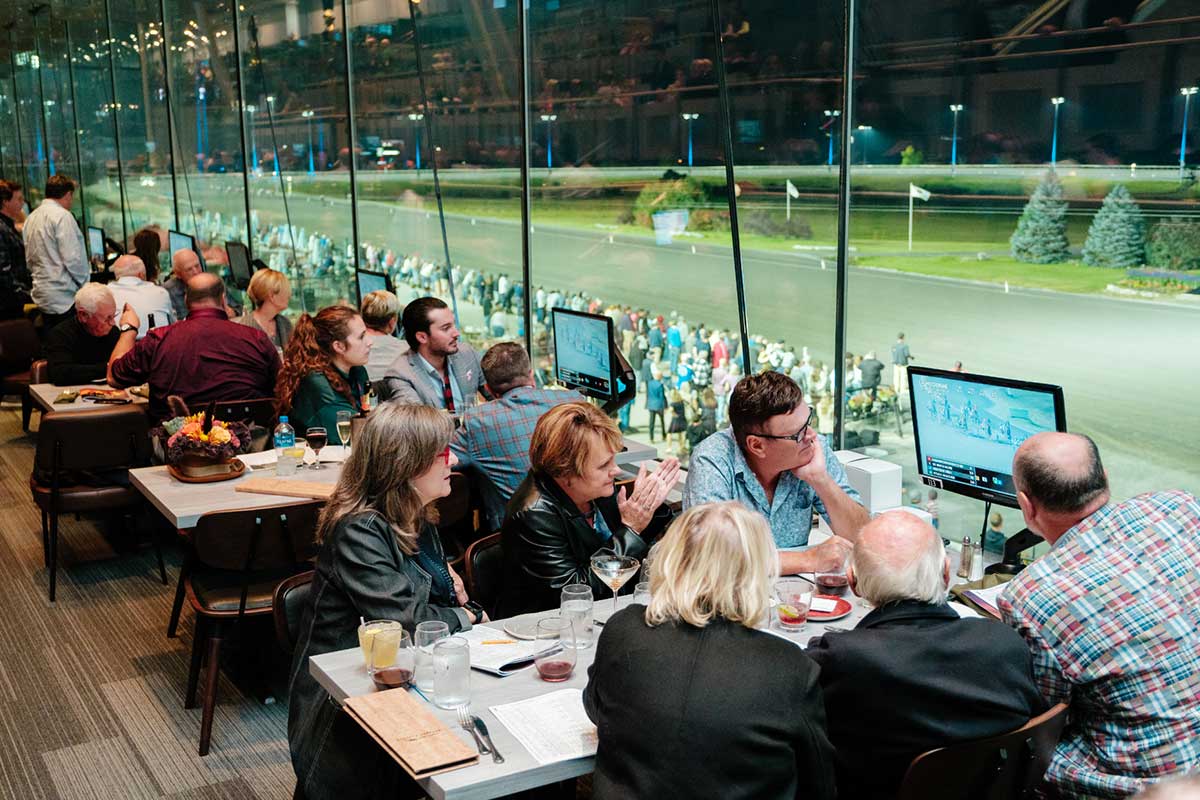 Mohawk Harvest Kitchen Guests Enjoying Races