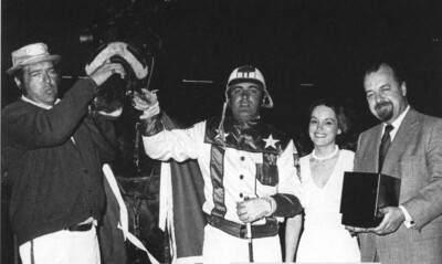 This winner’s circle was a happy gathering on June 1, 1974 as the very first OSS event became history. The Hon. John Clement, on the far right, welcomes Robra Glider and co-owner Ron Feagan to make a trophy presentation. Bruce Smith, co-owner, was not present for the event. Assisting is Garden City hostess Pat Cranston. Unfortunately, I don’t have a name for the winning caretaker.